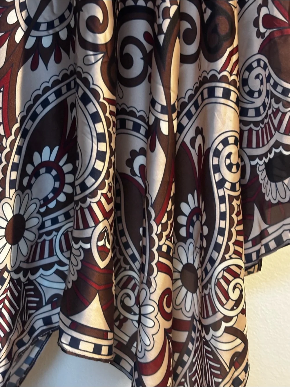 elegant brown, white, and burgundy silk scarf features an ornate floral